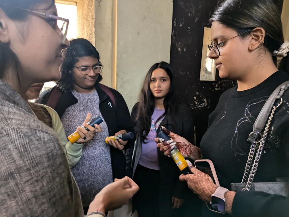 Gen Z students gathered around a brand activation on campus
