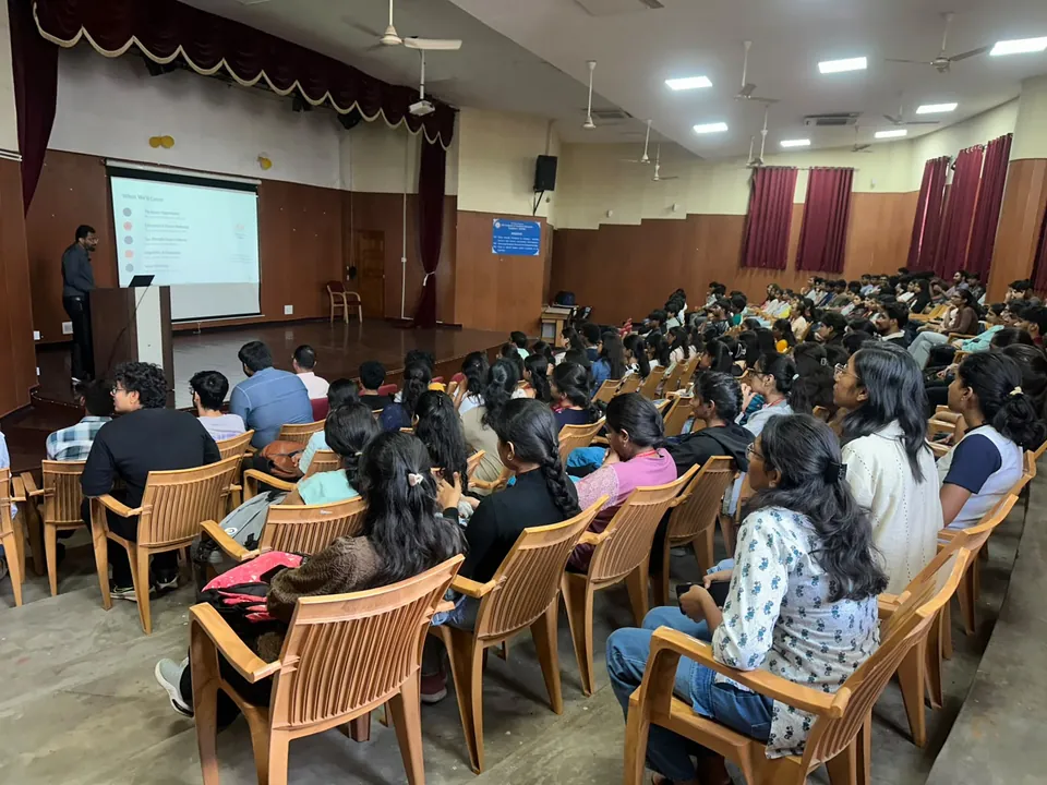 Seminar hall full of students at a college event